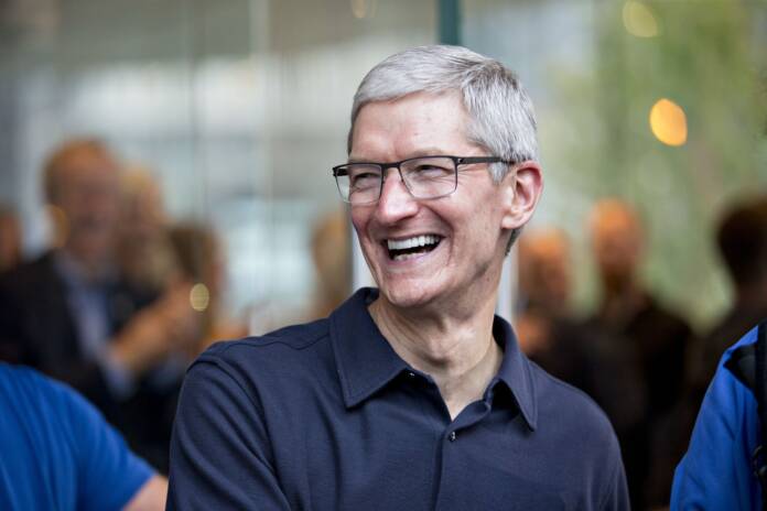 Tim Cook is surprised by fan's Macintosh at Apple store opening in Mumbai
