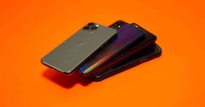 stack of phones 2022 rebranding orange 03.jpg