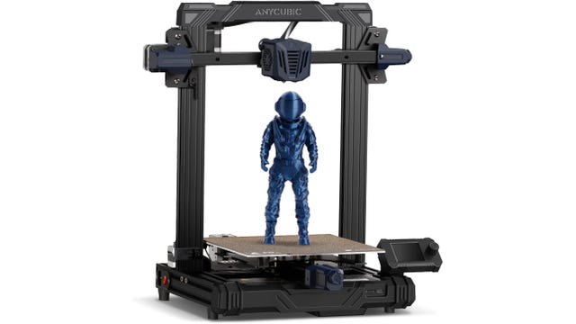 Black 3D printer with a blue space man on it.