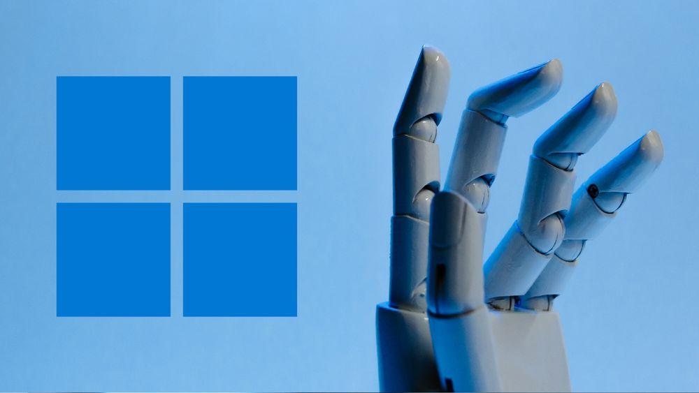Robot hand next to the Windows 11 logo