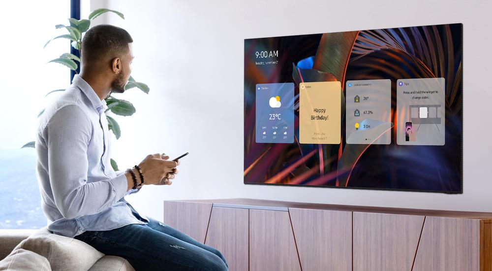 person interacting with a samsung smart tv